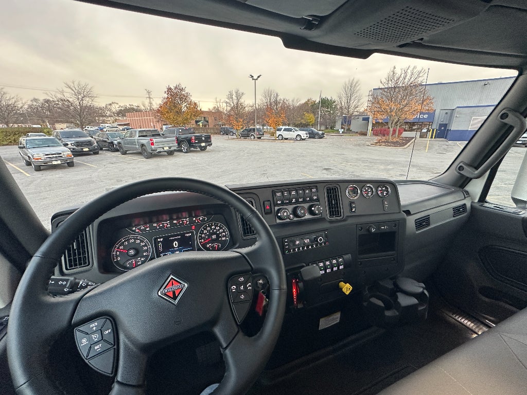 2025 International MV607 WITH A CENTURY 21' STEEL CARRIER